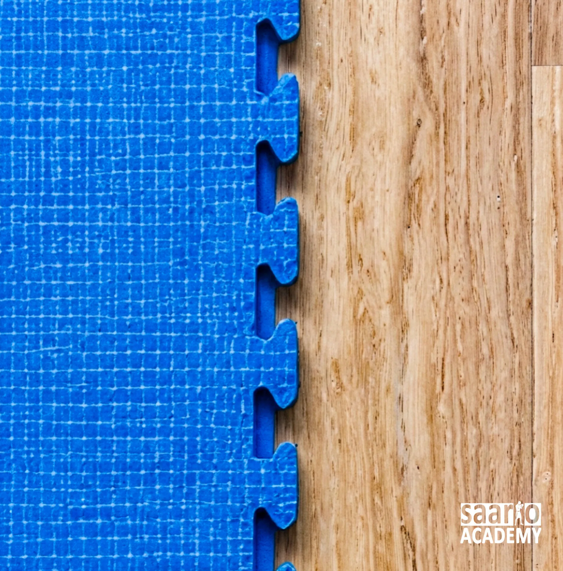 The Saario Academy training mat, the Academy mark in its corner